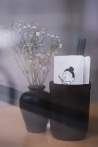 Restaurant window sneak-peak. Logo was too cute to just walk past without taking a photo. (Mama Bao in Munich, Maxvorstadt)